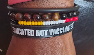 Educated not vaccinated (black and white) wristband